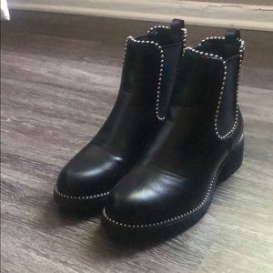 Black booties with silver detail